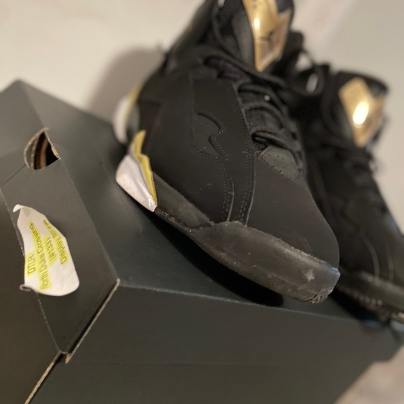 Jordan Black and Gold Sneakers